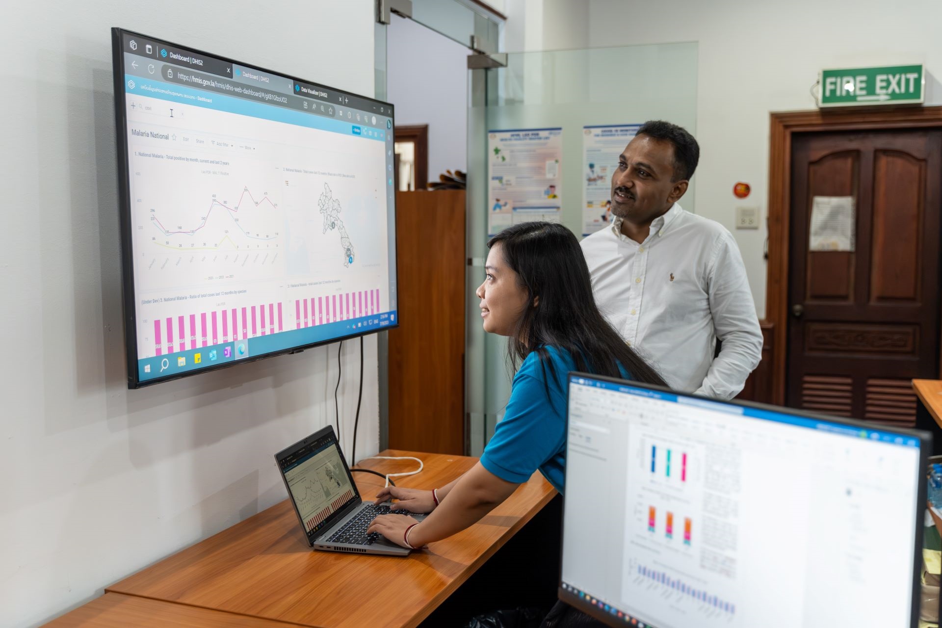 20230719_MortalityHIS-507-Enhanced-NR Two WHO staff members review maternal health data.